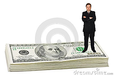 Businessman on money Stock Photo