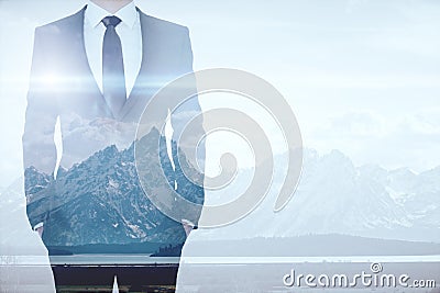 Businessman on mountains background multiexposure Stock Photo