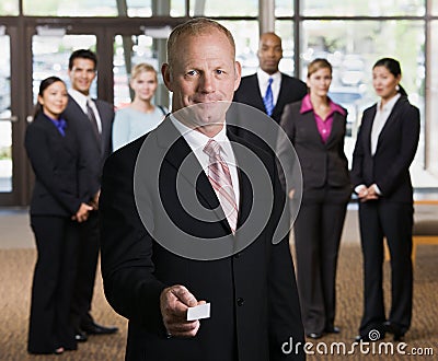 Businessman offering business card Stock Photo