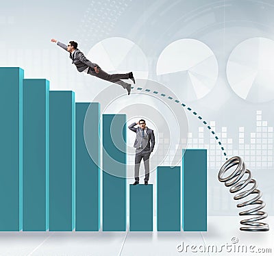 Businessman outperforming his competition jumping over Stock Photo