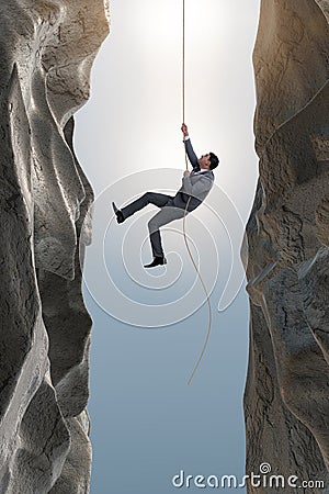 The businessman overcoming challenges in business concept Stock Photo