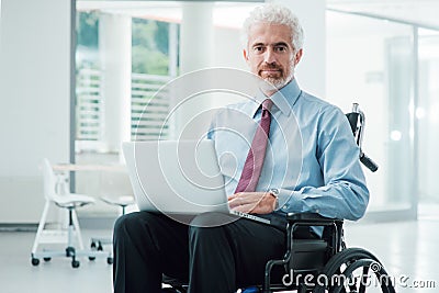 Businessman overcoming disability Stock Photo