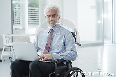 Businessman overcoming disability Stock Photo