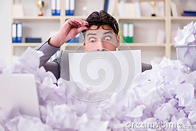 The businessman in paper recycling concept in office Stock Photo