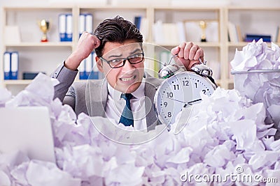 The businessman in paper recycling concept in office Stock Photo