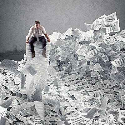 Businessman with paper sheet anywhere. Buried by bureaucracy concept. Stock Photo