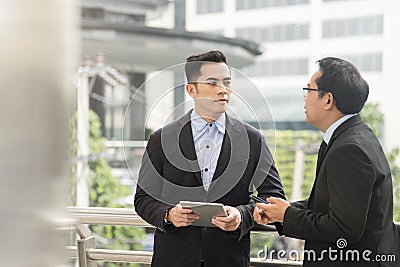 Businessman partner consulting and discussing Stock Photo