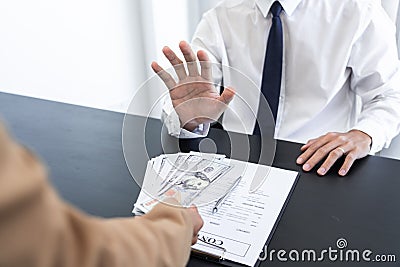 Businessman partner hand gesture rejecting refusing money, anticorruption concept Stock Photo
