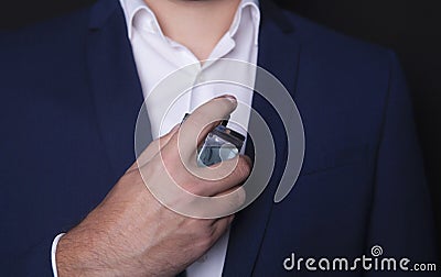 Businessman and perfume Stock Photo