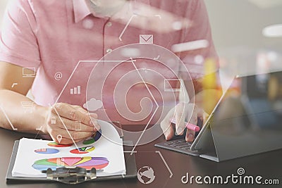 businessman in pink t-shirt working with digitl tablet computer Stock Photo