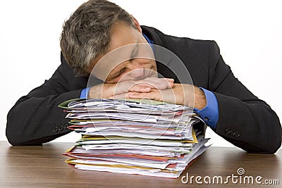 Businessman Playing With Dominos Stock Photo