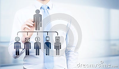 Businessman pointing at delegating pictogram Stock Photo