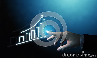 Businessman pointing graph and arrow increase Stock Photo