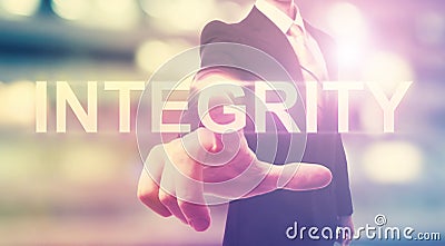 Businessman pointing at INTEGRITY Stock Photo