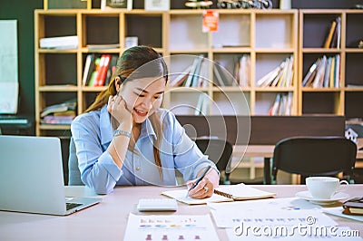 businessman pointing with pen on business report chart are working on accounts in business analysis with graphs and documentation Stock Photo