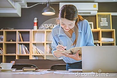 businessman pointing with pen on business report chart are working on accounts in business analysis with graphs and documentation Stock Photo