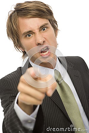 Businessman points in anger Stock Photo