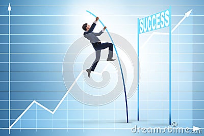 The businessman pole vaulting over towards his success career Stock Photo