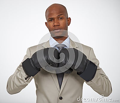 Businessman, portrait and boxing gloves for corporate competition for opportunity, rival or victory. Black man, face and Stock Photo