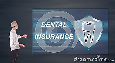 Businessman presenting a dental insurance concept on a wall screen Stock Photo