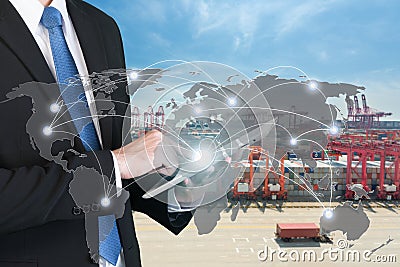 Businessman press digital tablet to show global network partners Stock Photo