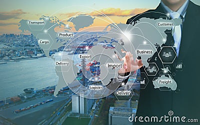 Businessman pressing logistics button on virtual screens Stock Photo