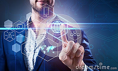 Businessman pressing on virtual icons in cyberspace. Stock Photo