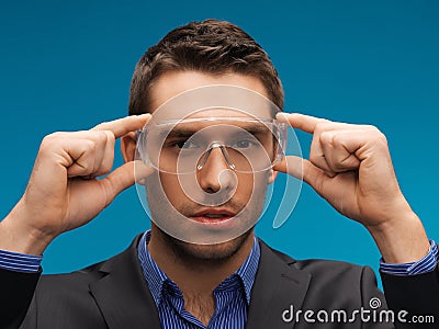 Businessman in protective glasses Stock Photo