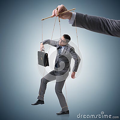 The businessman puppet being manipulated by boss Stock Photo