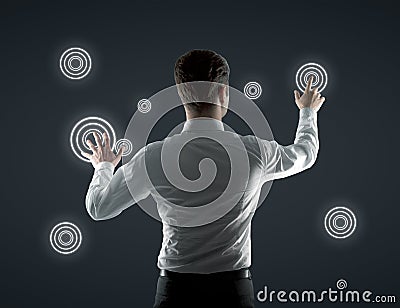 Businessman pushing interface Stock Photo