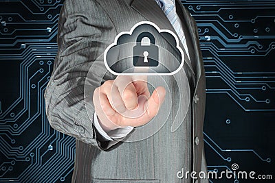 Businessman pushing virtual cloud security button Stock Photo