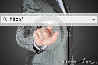 Businessman pushing virtual search bar Stock Photo