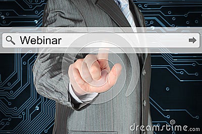 Businessman pushing virtual search bar with webinar word Stock Photo