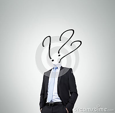 Businessman with a question mark Stock Photo