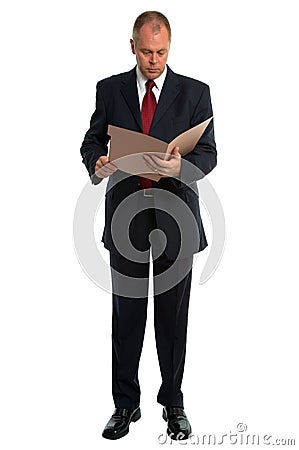 Businessman reading a file Stock Photo