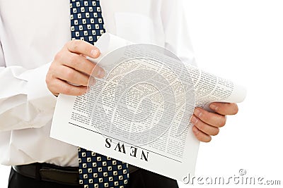 Businessman reading news Stock Photo