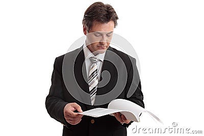 Businessman reading report Stock Photo