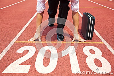 Businessman ready to run and 2018 new year Stock Photo