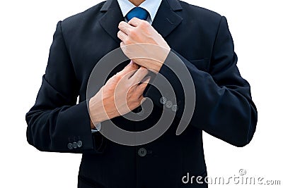 Businessman rearrange his neck tie Stock Photo