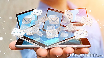 Businessman receiving e-mails on his digital devices 3D rendering Stock Photo