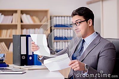 The businessman receiving letter envelope in office Stock Photo