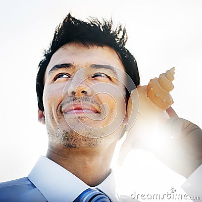 Businessman Relaxation Beach Summer Seashell Concept Stock Photo