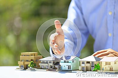 Businessman and residential model Stock Photo