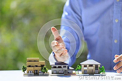 Businessman and residential model Stock Photo