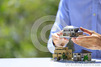 Businessman and residential model Stock Photo
