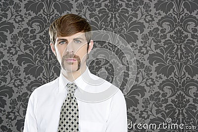 Businessman retro mustache over gray wallpaper Stock Photo