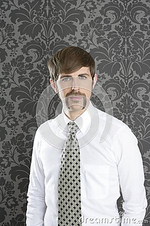Businessman retro mustache over gray wallpaper Stock Photo
