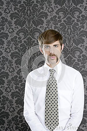 Businessman retro mustache over gray wallpaper Stock Photo