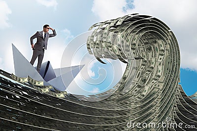 The businessman riding paper boat in dollar sea Stock Photo