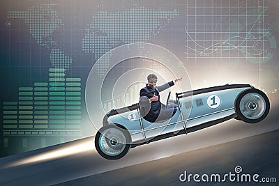 The businessman riding sports car against charts Stock Photo